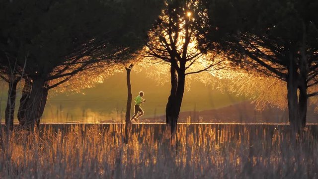 Man running outdoor at sunset