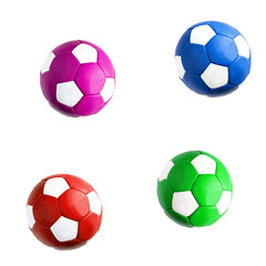 Four colored soccer balls isolated on white background