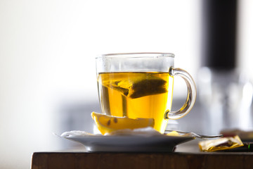 Tea glass cup with tea bag and lemon