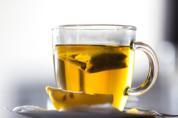 Tea glass cup with tea bag and lemon