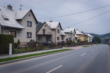 Fototapeta na wymiar Main road in Hutisko-Solanec, small village in tourist district Beskids - Moravian Wallachia in Czech Republic