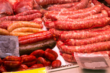 Fresh meat delicacies, sausages, frankfurter, kupata in food market. Countertop in food hypermarket. Costa Brava, Catalonia, Blanes Spain