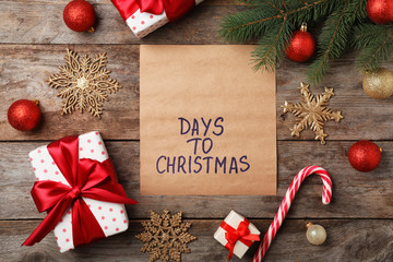 Flat lay composition with festive decor on wooden background. Christmas countdown