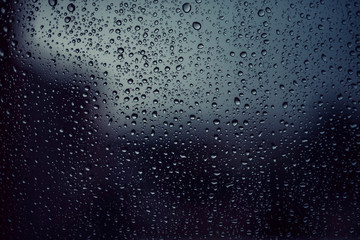 Naklejka na ściany i meble Raindrops on window