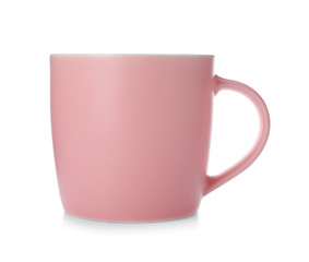 Pink ceramic cup isolated on white
