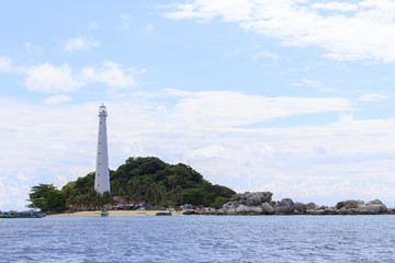 Fototapeta premium Rock Formations By Sea Against Sky, Belitung-Indonesia