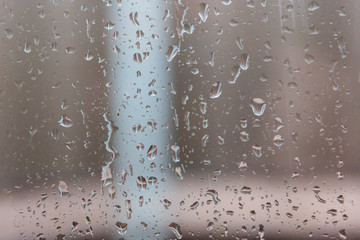 water droplets of rain on the window in winter in adelaide south australia on 19th July 2018
