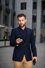 Confident young businessman outdoors