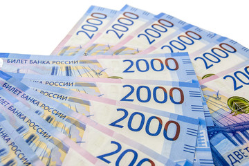 Russian cash. Denominations of 2000 rubles was lying on a white background.