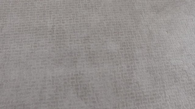 Close panning shot of beautiful new carpet