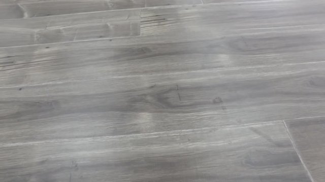 Close panning view of new beautiful wood floor