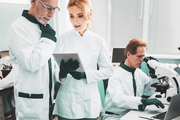 Mutation process. Intelligent professional biologists feeling involved in studying mutation process...