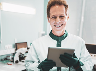 Chemical analysis. Modern promising scientist feeling extremely happy after finishing chemical...