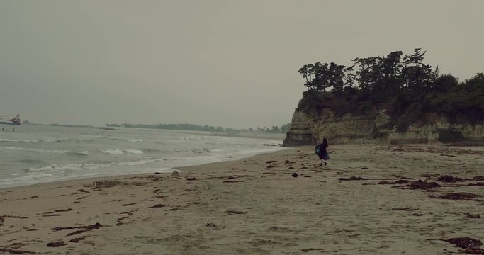 Female surfer on beach