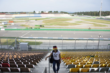 Traveler thai women visit and posing for take photo in Hockenheimring a motor racing course