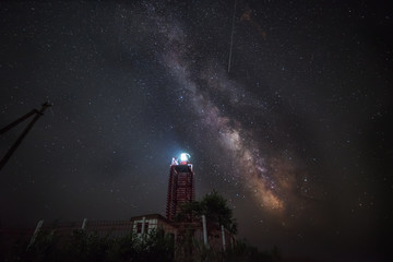 Night photo. The Milky Way and the falling stars of the Perseid meteor shower in August over the...