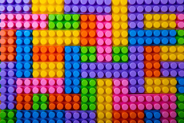toy plastic building blocks background. top view