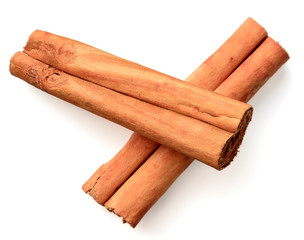 cinnamon sticks isolated on the white background, top view