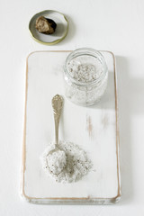 Sea salt with truffle and truffle on a light background. Rustic style.