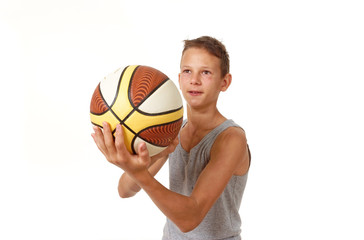 teenager with a basketball on a white background.