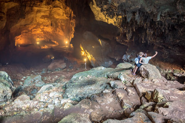 Fototapeta na wymiar Unidentified people taking selfie inside cave of Chasm of Heaven in Silifke district, Mersin Turkey