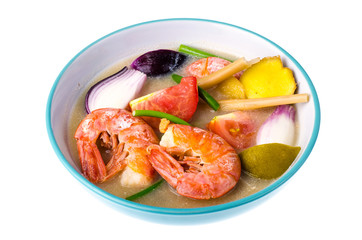 Spicy soup with prawns on coconut milk