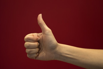 Thumb up sign with hand