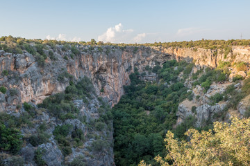High resolution panoramic Aerial interior view of the Chasm of Heaven located in Silifke district,...