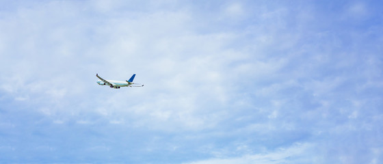 travel and transportation concept from aircraft fast and fly with blue sky and cloud background