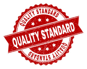 Obraz premium QUALITY STANDARD seal print with distress texture. Rubber seal imitation has round medallion form and contains ribbon. Red vector rubber print of QUALITY STANDARD title with scratched texture.