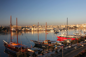 Ancient wooden pirate ships in port Sliema