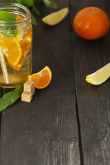 Refreshing summer cocktail with chopped ice and citrus fruits