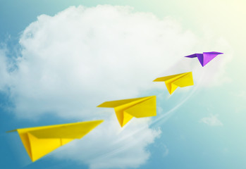 Leadership Concept. Unique Paper Plane Leading the Team into the Sky for Goals and Success in...