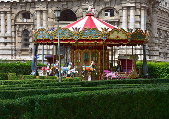 Italy, Rome, children's carousel in the historic center of the city.