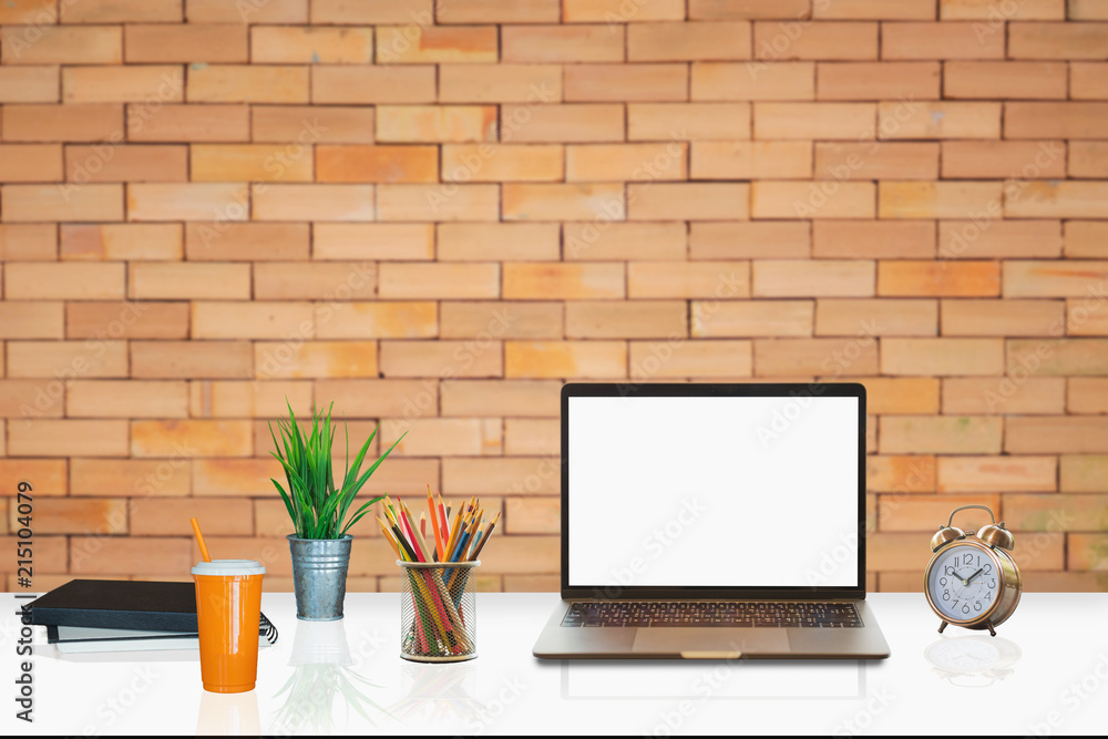 Poster mock up : workspace with blank white desktop computer, pencils and stationery items. blank screen fo