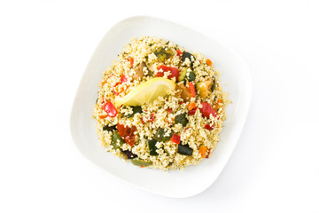 Couscous with vegetables isolated on white background. Top view