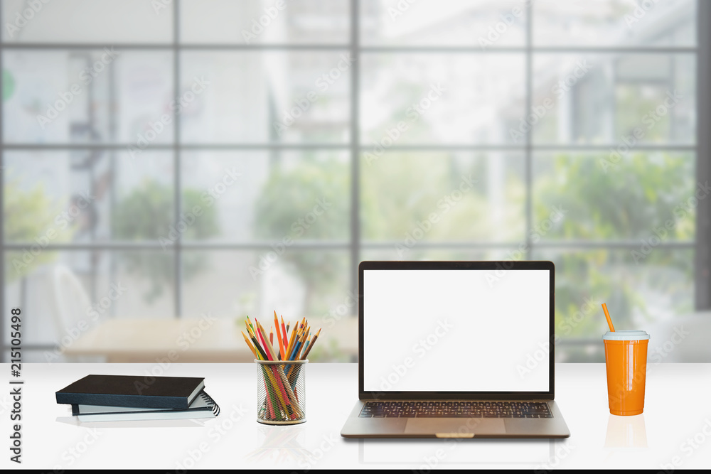 Poster mock up : workspace with blank white desktop computer, pencils and stationery items. blank screen fo