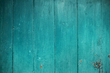 Shabby and very old wooden fence-color aquamarine.