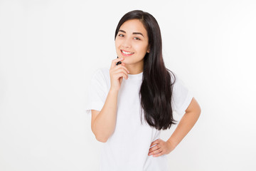 Portrait of smiling Brunette asian girl with long and shiny straight female hair isolated on white background . Beautiful woman korean model with straight hairstyle. Healthy teeth. Copy space.
