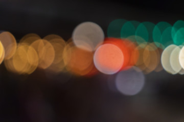 de focused bokeh light, abstract background at night photo