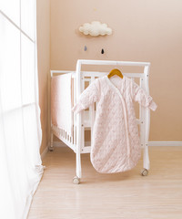 Fototapeta na wymiar Infant warm sleeping bag isolated over white.With clipping path.