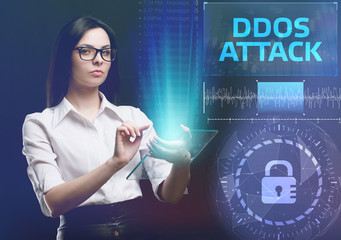 The concept of business, technology, the Internet and the network. A young entrepreneur working on a virtual screen of the future and sees the inscription: Ddos attack