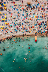 Aerial Drone View Of People Having Fun And Relaxing On Costinesti Beach In Romania At The Black Sea