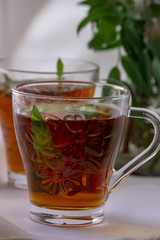 Fototapeta na wymiar Two glasses of tea with fresh mint 