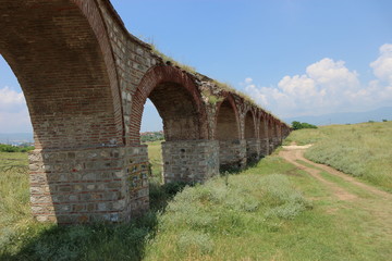 Fototapeta na wymiar Old aqueduct in Skopje, Republic of Macedonia