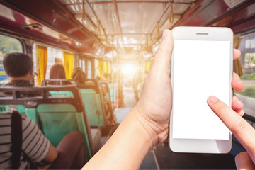 Use smartphone blurred images touch of World figure in Abstract inside the bus with passengers...