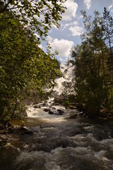 nature landscape landscape mountains valley hills rocks cave water waterfall stream river stream rock stone sky  grass trees green blue white tourism excursions Russia