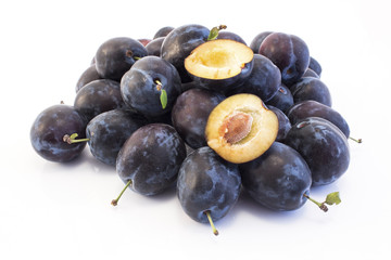 Ripe Plums Isolated on White