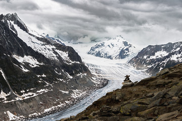 Aletsch glacier with dramatic cloudy sky