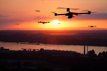 group of drones approaching the city